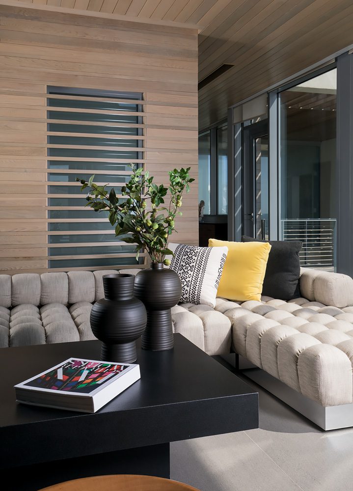 A living room with a couch and a coffee table.