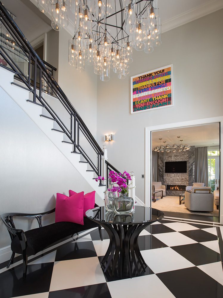 A black and white checkered floor in a foyer.